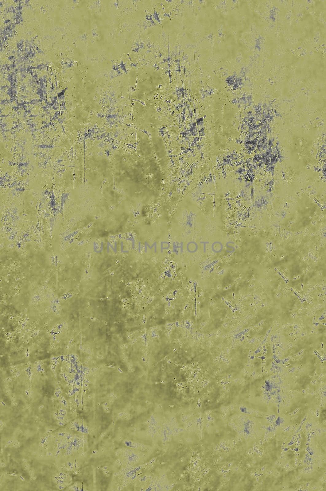 The background texture of the matte mustard-colored surface with spots and scratches