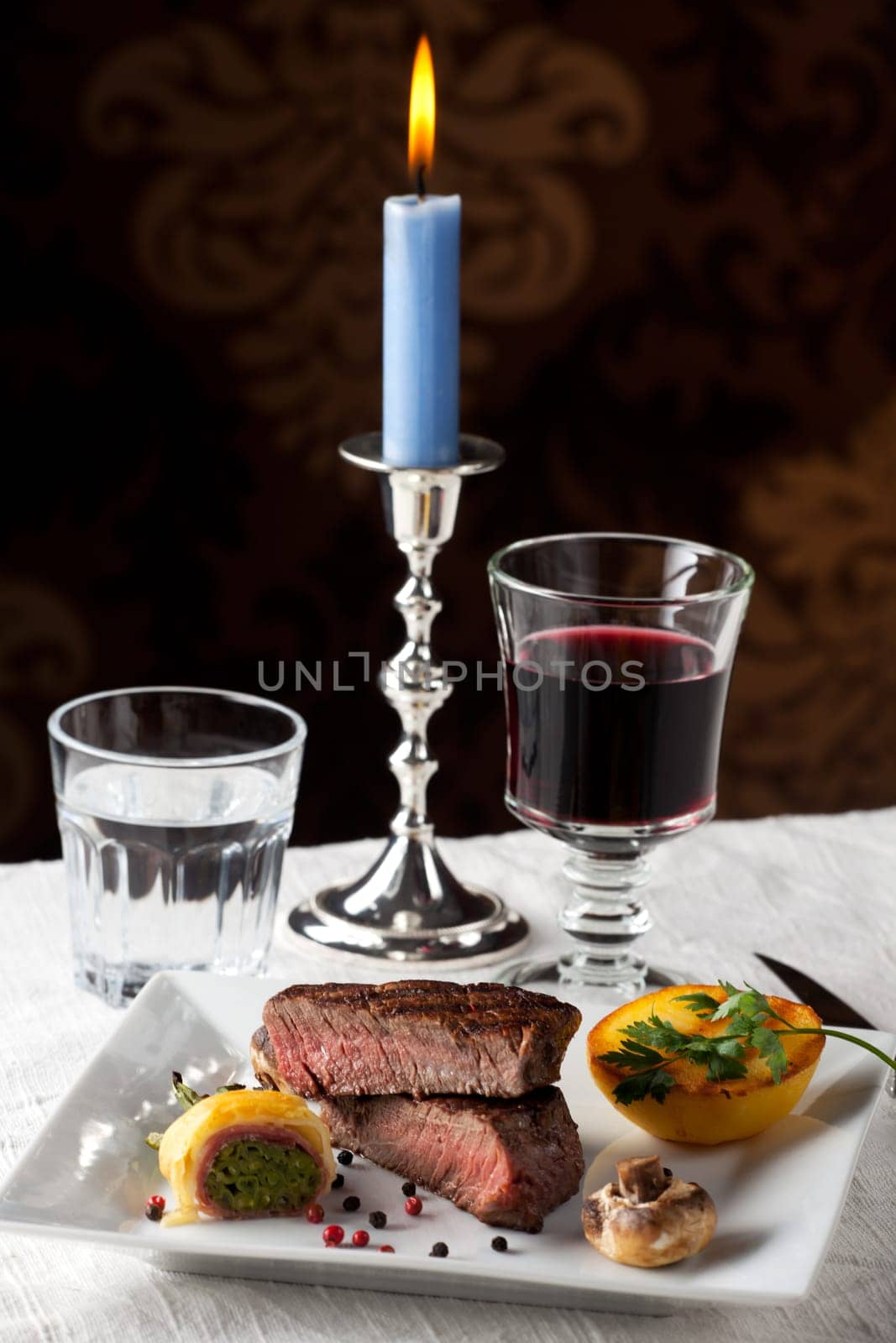 steak with grilled potato on a plate