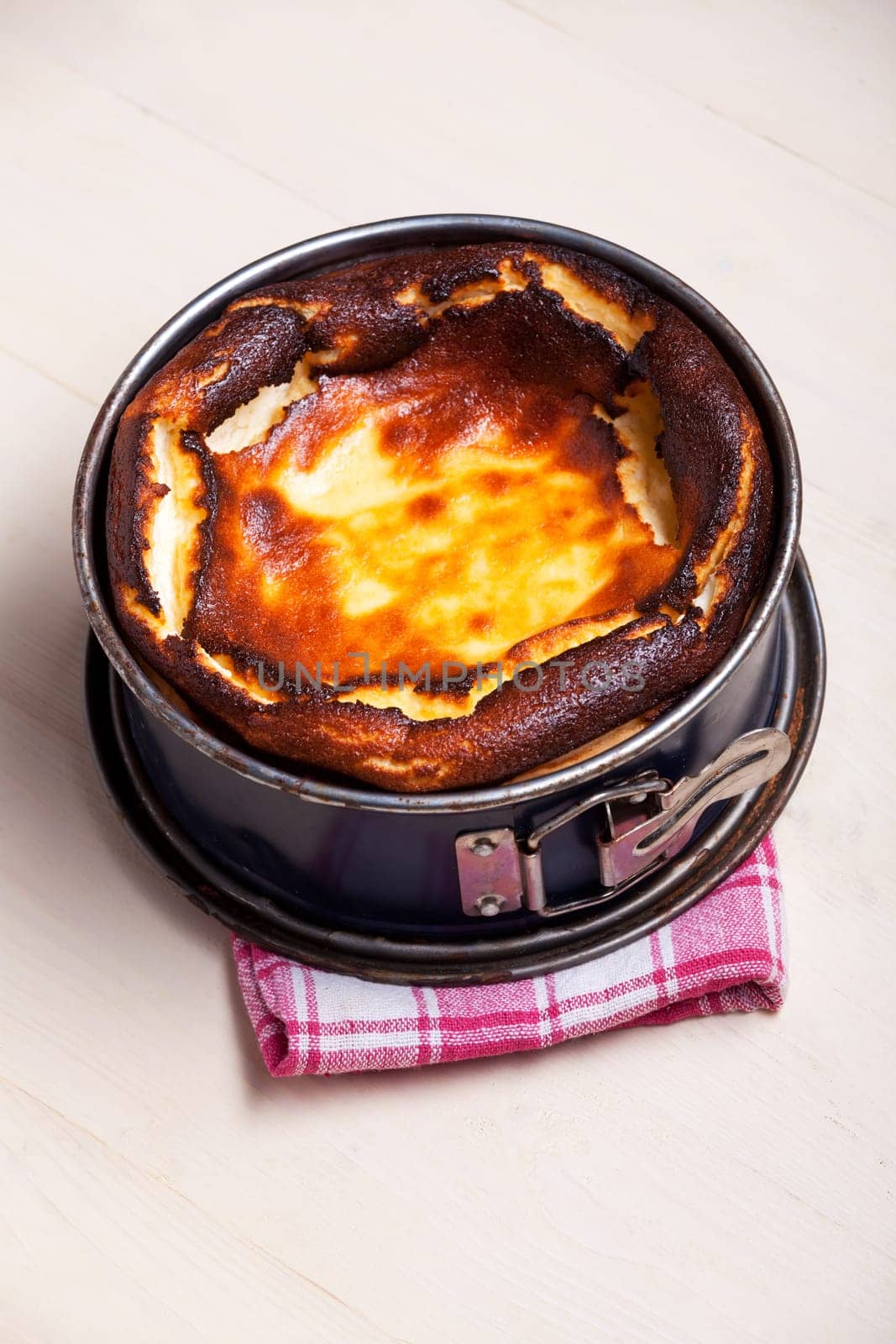 fresh cheese cake in the baking pan