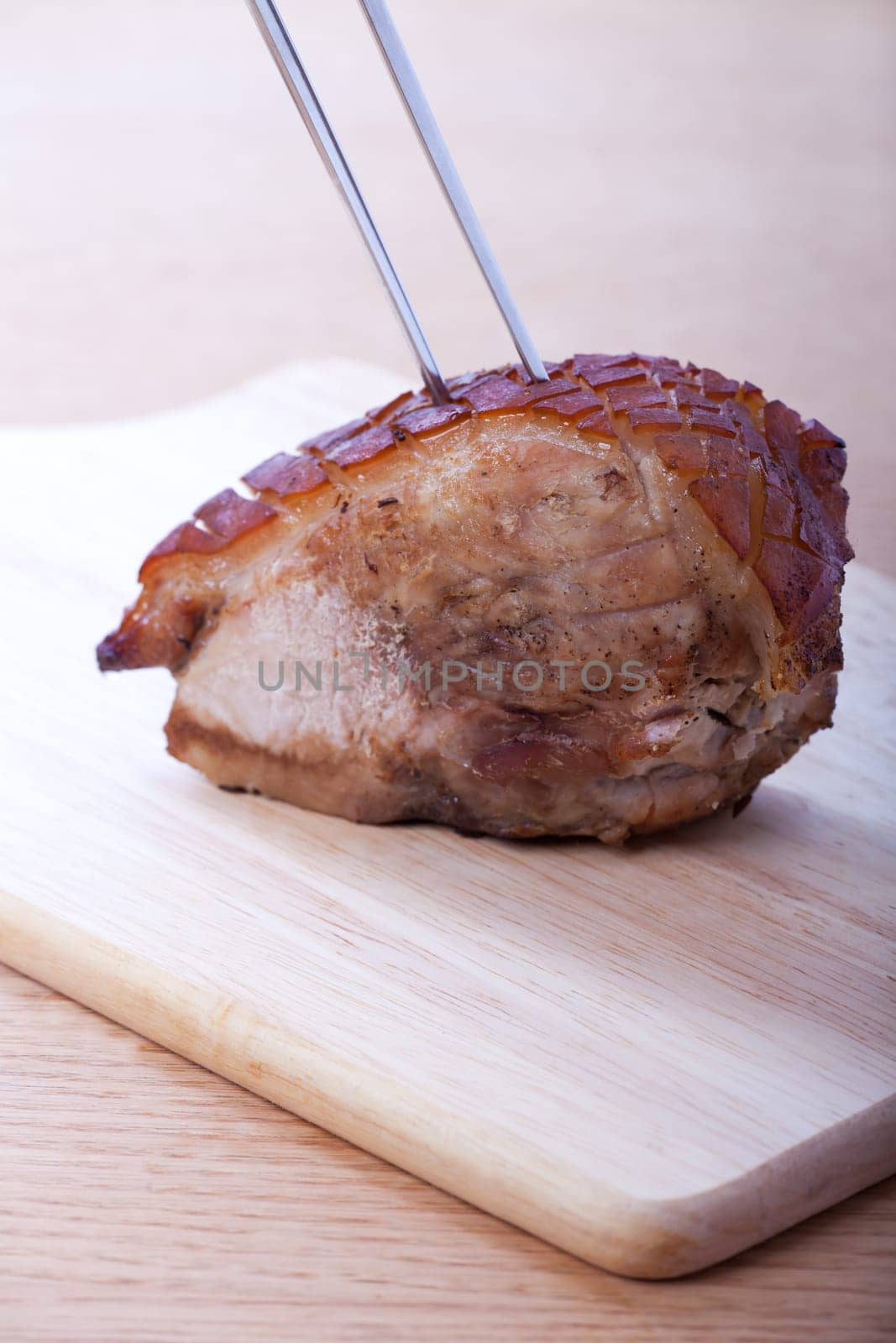 roasted pork ready to be sliced