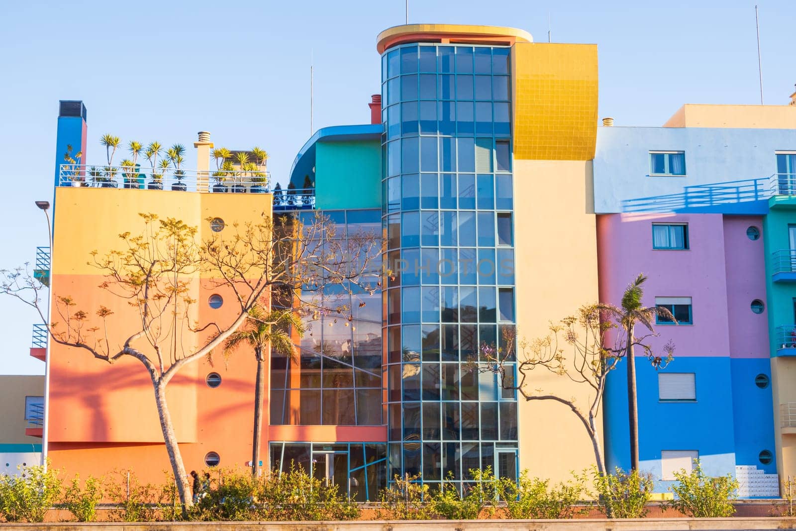 Albufeira, Portugal - April 28, 2024: Colorful facades of modern residential buildings photographed in Marina port of  Albufeira at the Algarve coast of Portugal