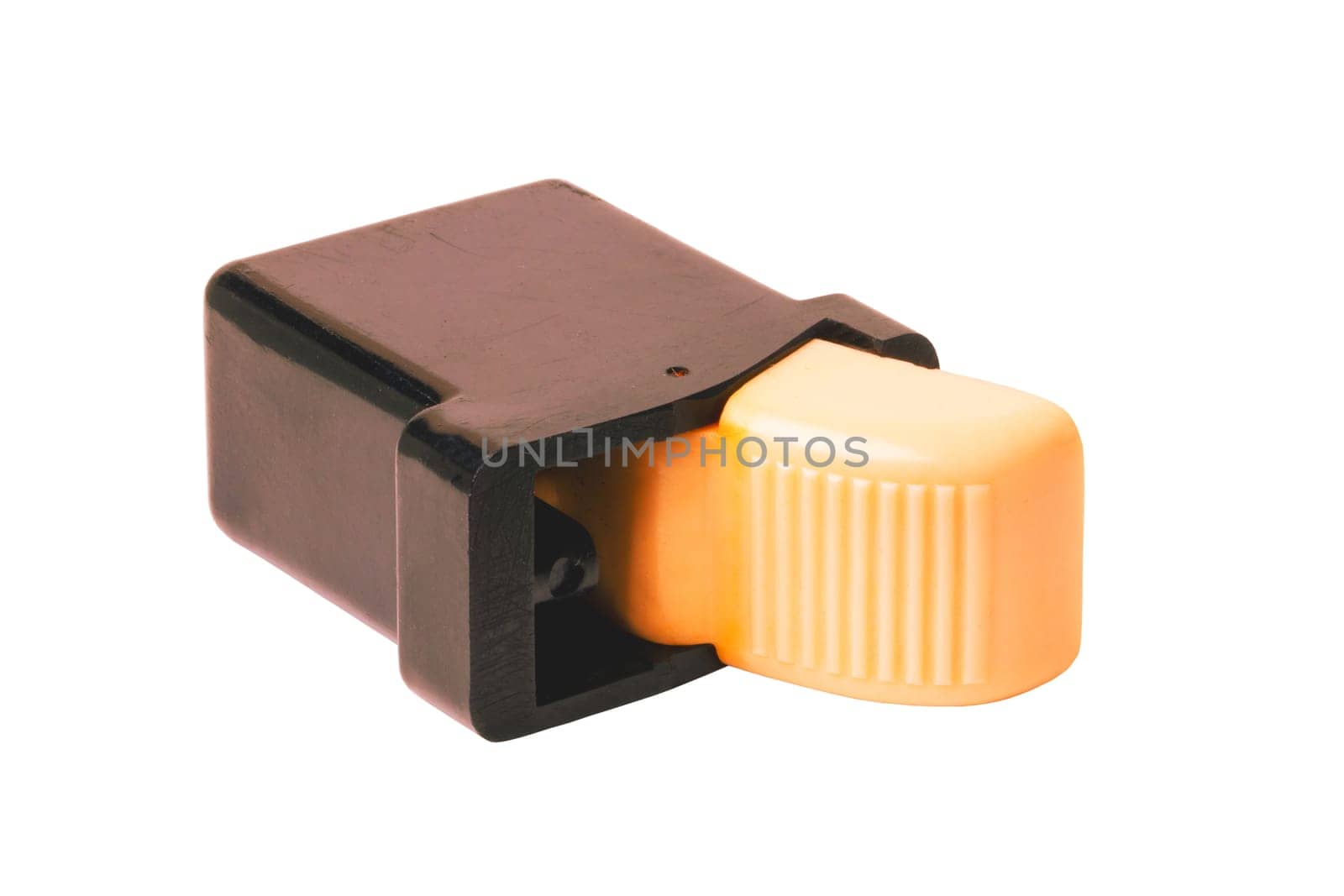 Vintage spare parts for cars. Close-up of a four-pole ivory-coloured button switch from the production of vehicle electrics in GDR times. Clipping path. Around 1960.