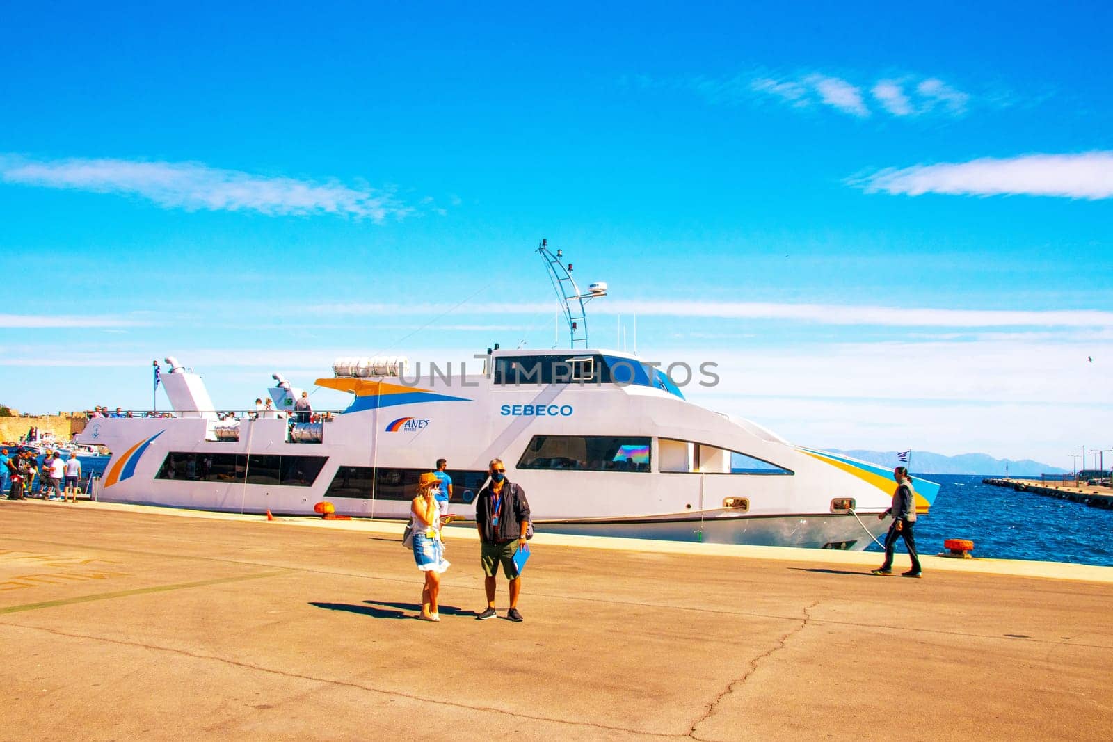 SYMI, Greece - JUN 03, 2021. The ship is moored in the harbour of Rhodes, belongs to the Sebeco Lines fleet and sails to the island of Symi. Space for 200 passengers.