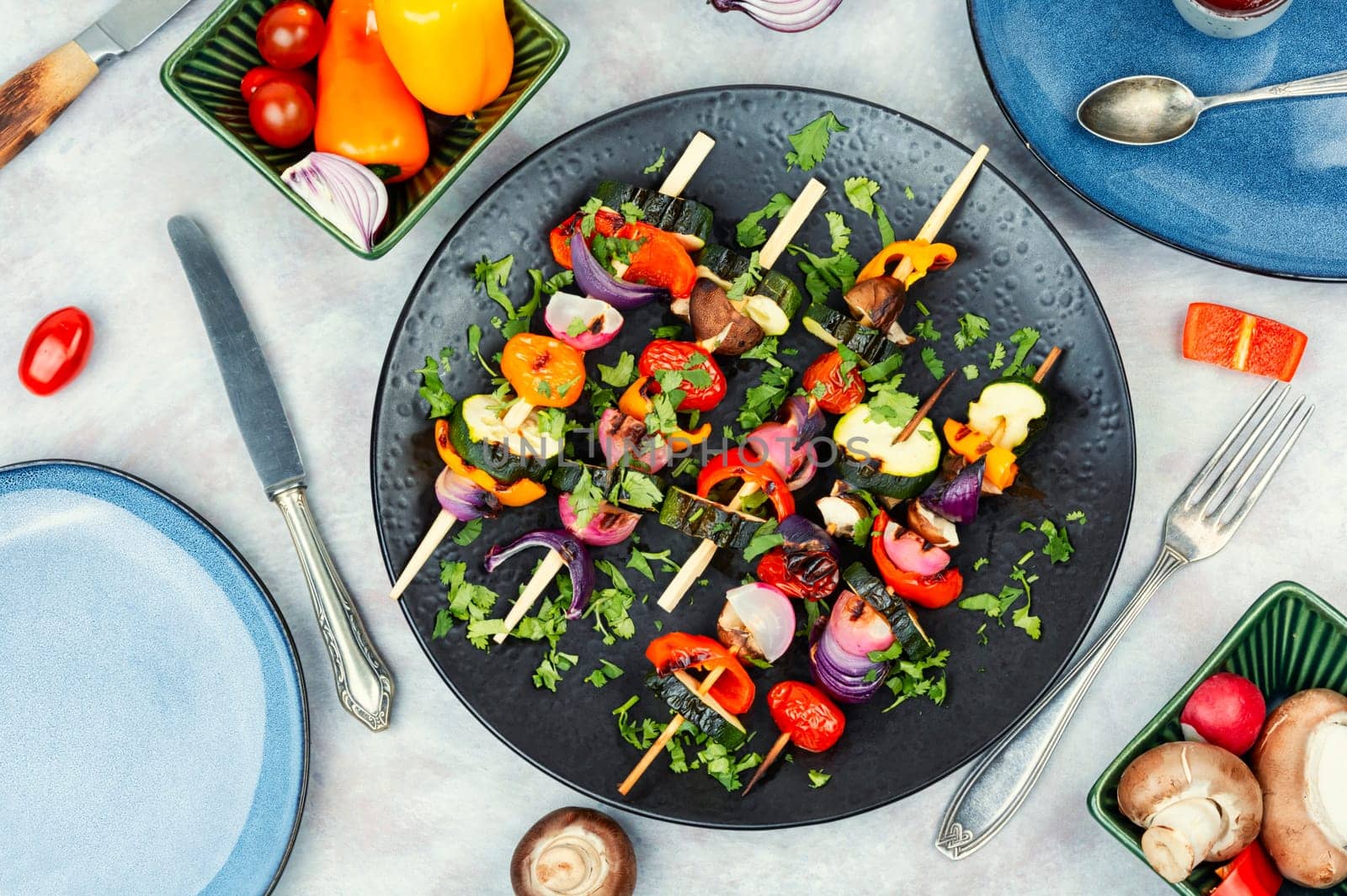 Vegan shashlik of fresh vegetables on wooden stick.