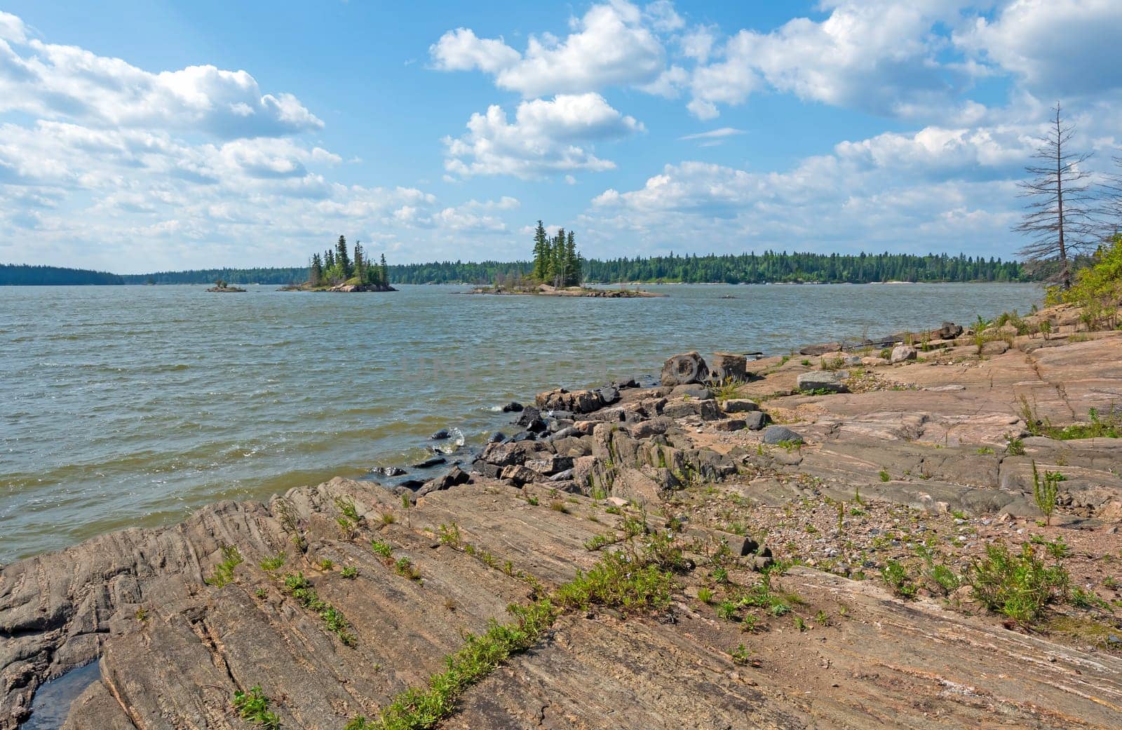 Rocky Shore on a Windblown Lake at Paint Lake Provincial Park in Mantoba