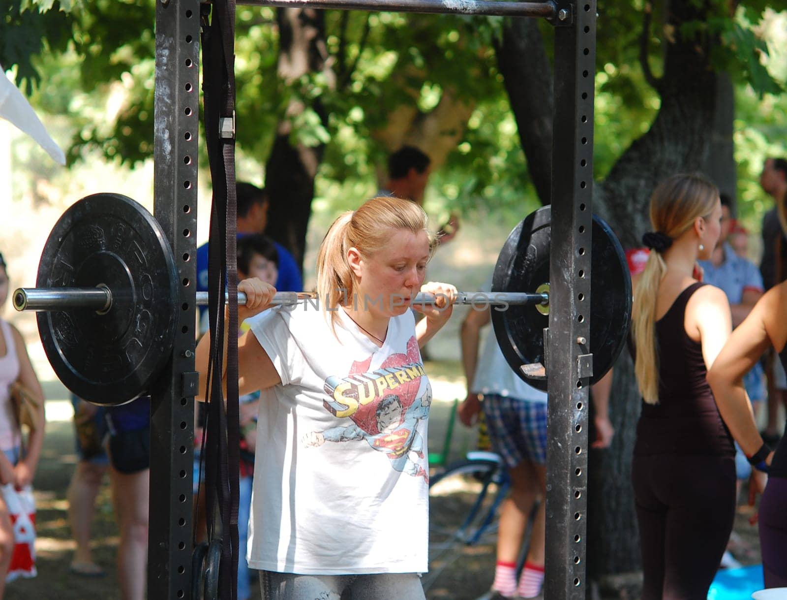 Russia, Volgodonsk - may 17, 2015: Training over the bar. Weight lifting exercise with weights