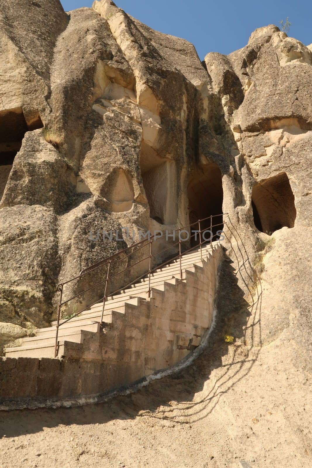 Stairs leading up to a rock hewn, rock cut church next to the Snake Church, Yilanli Kilise, Göreme, Cappadocia, Turkey 2022