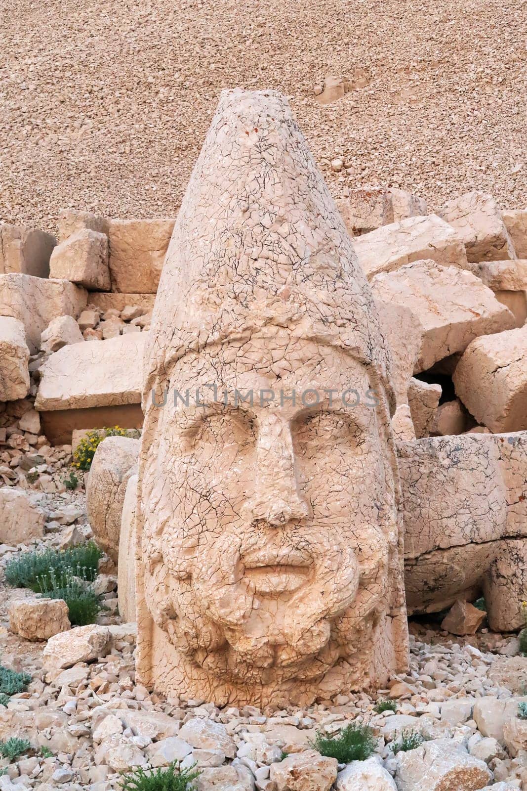 Head of a stone statue, sculpture of Zeus on the West Terrace of Mount Nemrut, close to Adiyaman, Turkey 2022