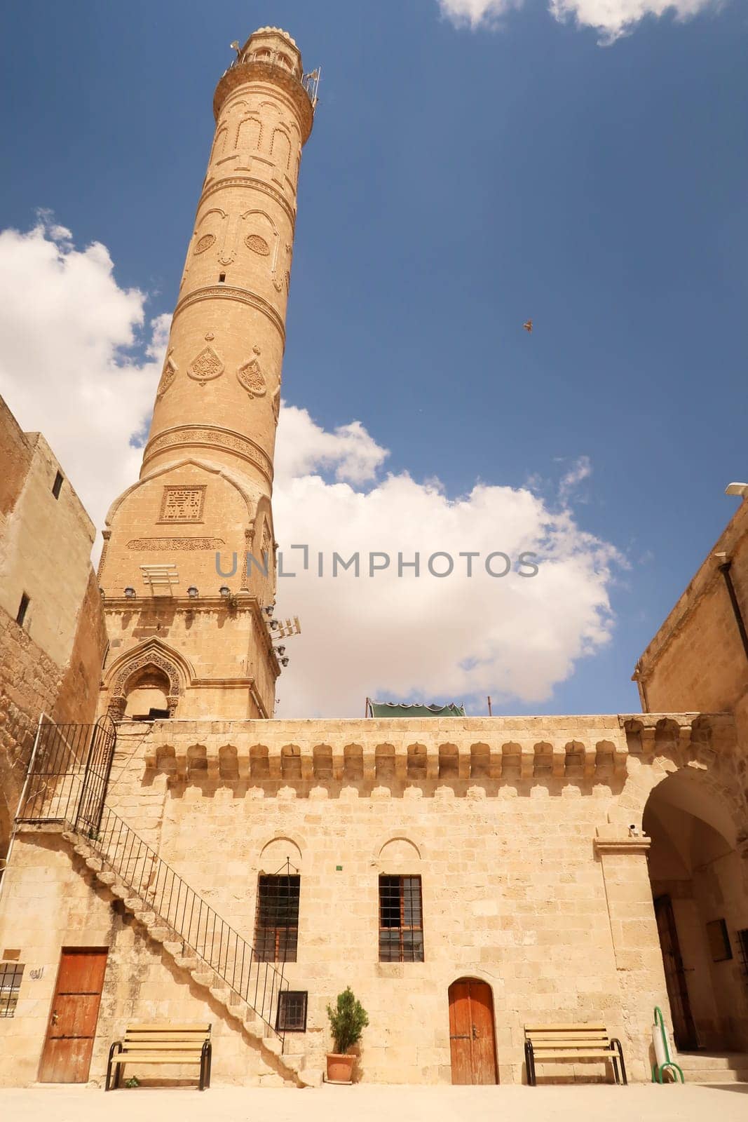 The facade and minaret of the Great, Grand Mosque, Ulu Camii in the old town of Mardin, Turkey 2022