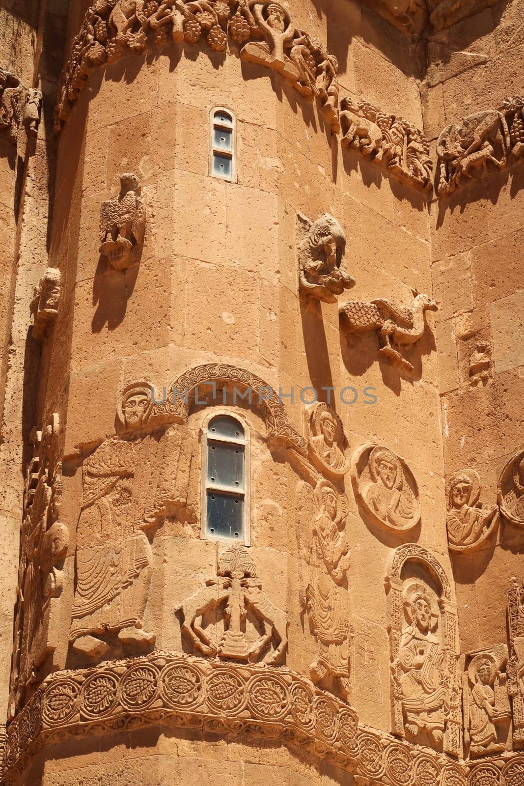 Closer look on the elaborate bas-relief, relief carvings on the facade of the Armenian Cathedral of the Holy Cross showing biblical scenes, Akdamar Island, Lake Van, Van Gölü, Van, Turkey 2022