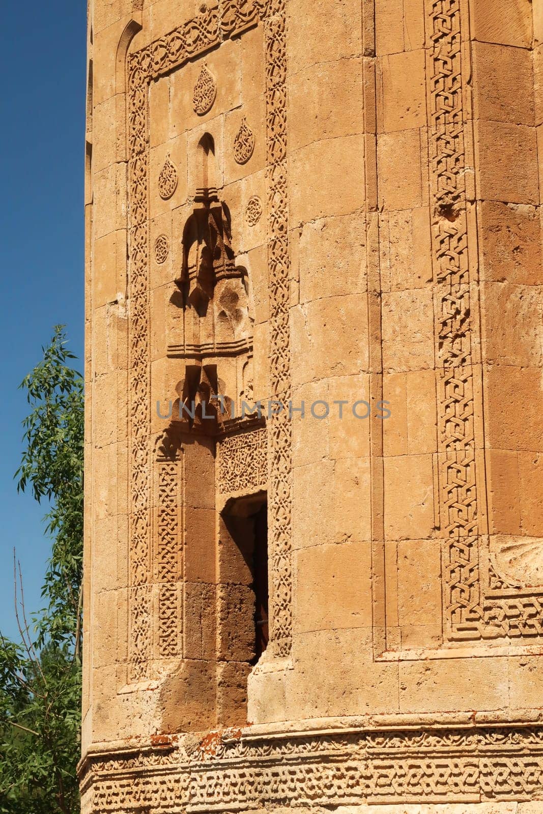Closer view onto the facade of the Halime Hatun tomb, grave, mausoleum, Halime Hatun Kümbeti, elaborate patterns, details, carvings, close to Lake Van, Van Gölü, Gevas, Turkey 2022