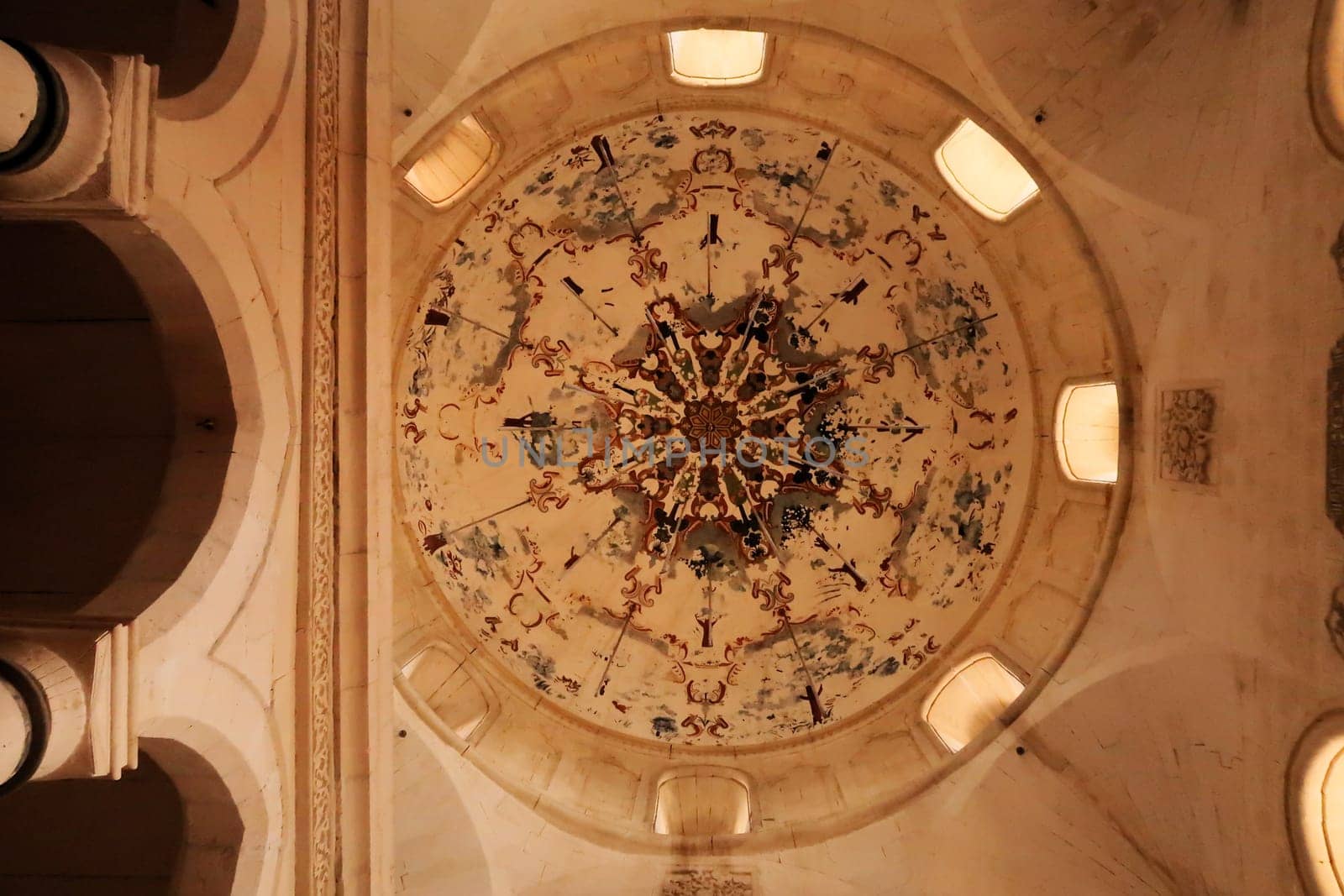 The ceiling, dome of the mosque inside the Ishak Pasha Palace, Sarayi showing wall painting, fresco with colorful patterns, Dogubeyazit, Turkey 2022