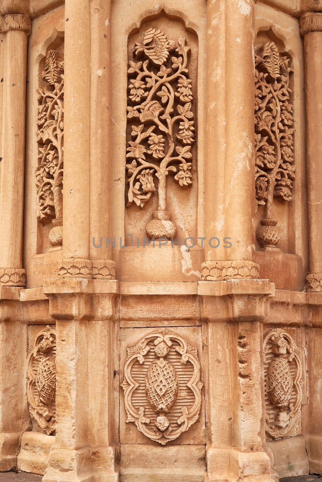 Elaborate floral, flower carvings on an ottoman tomb in the second court inside the Ishak Pasha Palace, Sarayi, Dogubeyazit, Turkey 2022