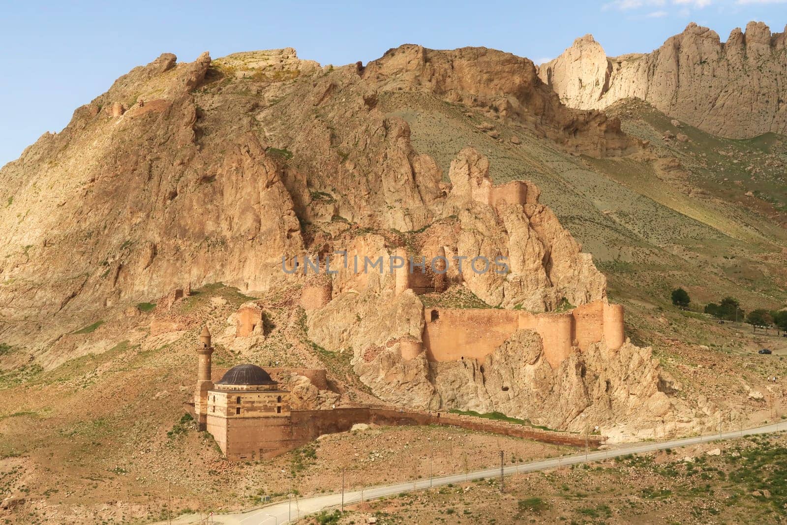 View onto the remains of the Dogubeyazit Castle, Kalesi built onto a steep mountain, steep rocks, cliffs, Dogubeyazit, Turkey 2022