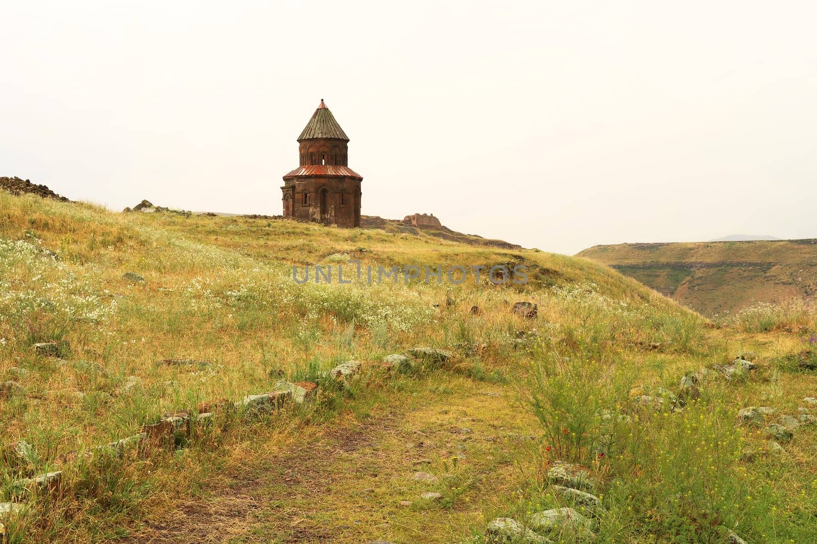 The beautiful Church of St., Saint Gregory of Abughamir, Abughamrens, Abughamrents surrounded by meadows at the ancient site of Ani, an abandoned ruined armenian city, close to Kars, Turkey 2022