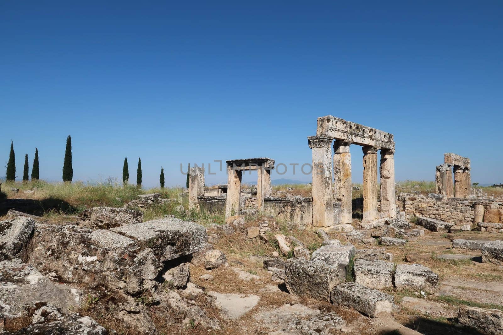 Ramaining structures of the Nymphaeum on the main street of the ancient ruins of Hierapolis, Pamukkale, Denizli, Turkey 2022