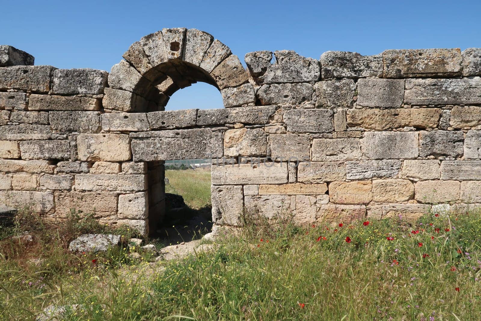 A gate entrance in the town wall of the archaeological site of Hierapolis, Pamukkale, Denizli, Turkey 2022