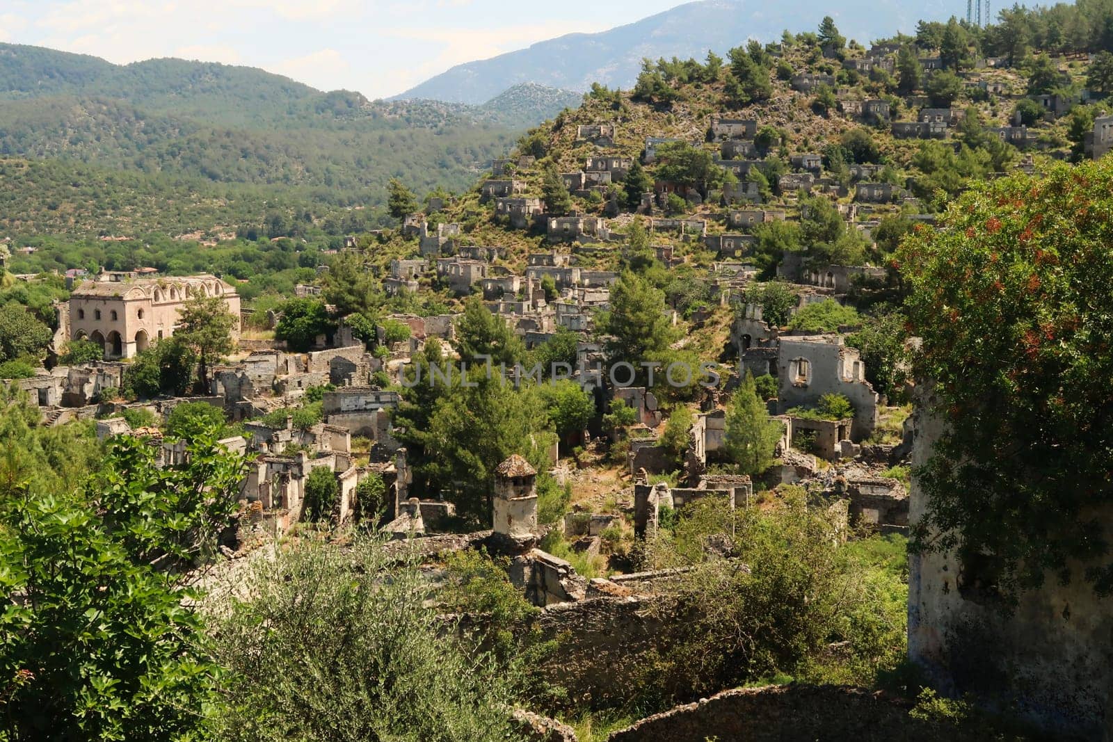View between the houses on the abandoned village of Kayaköy, Livissi, close to Fethiye, Turkey 2022