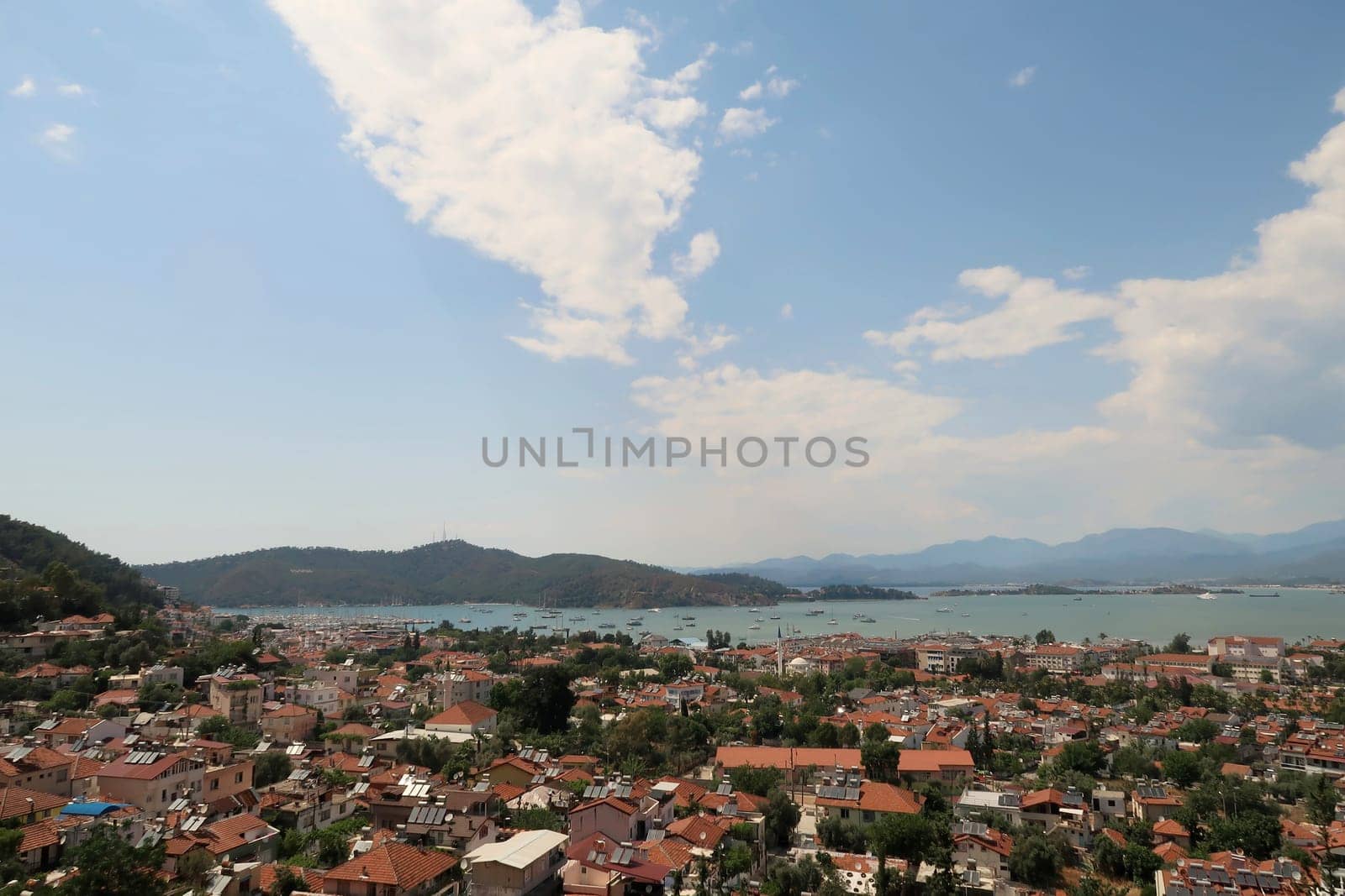 Spectacular view onto the town of Fethiye from the rock-hewn, rock-cut ancient lycian tomb of Amyntas, Turkey 2022