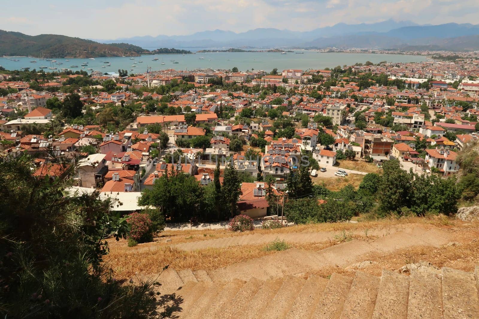 View onto the town of Fethiye from the rock-hewn, rock-cut ancient lycian tomb of Amyntas, Turkey 2022