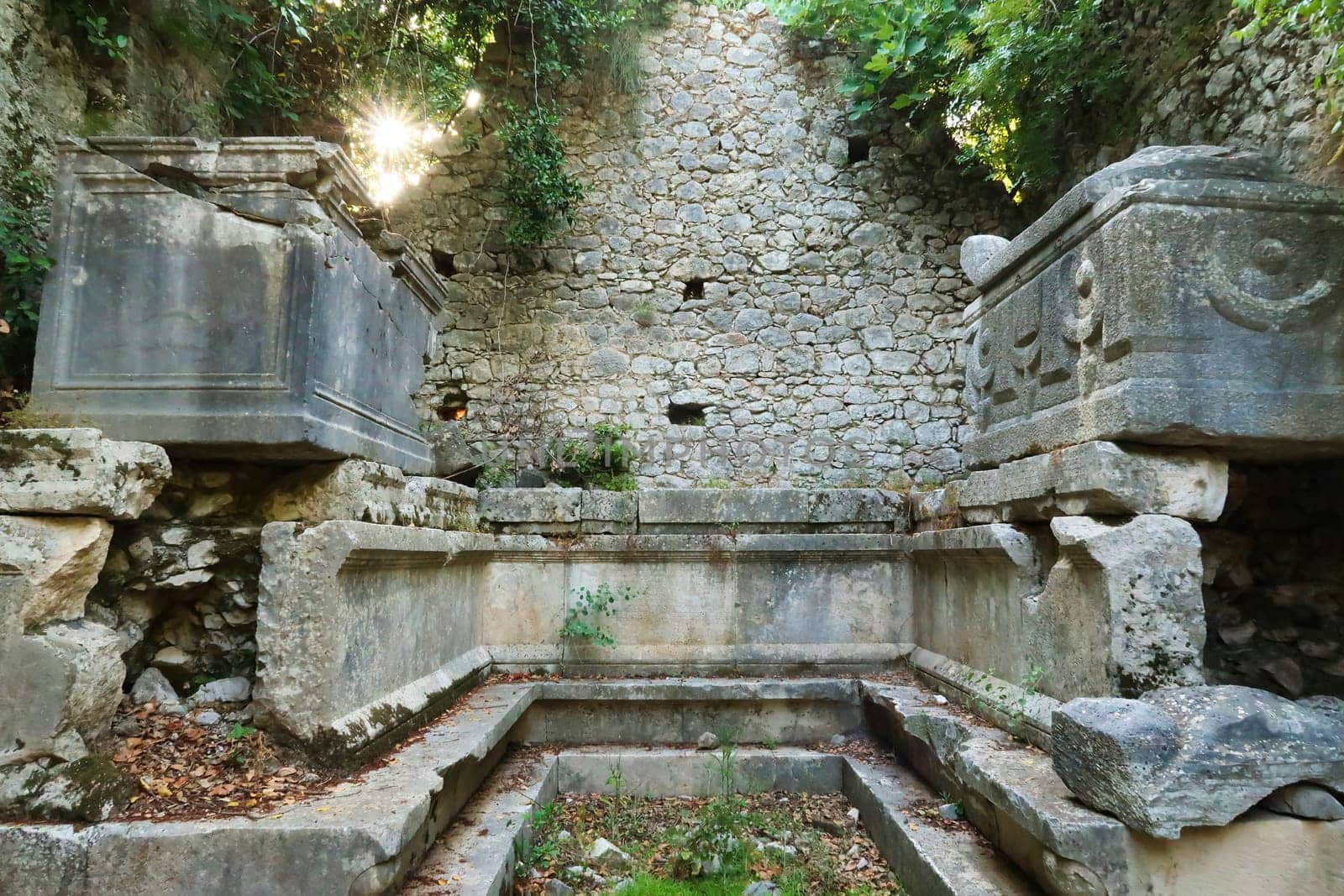 The two Sarcophagus Sarcophagi in the tomb of Lyciarch Marcus Aurelius Archepolis, sun light coming in from the background, ancient site of Olympos, Olympus, close to Antalya, Turkey 2022