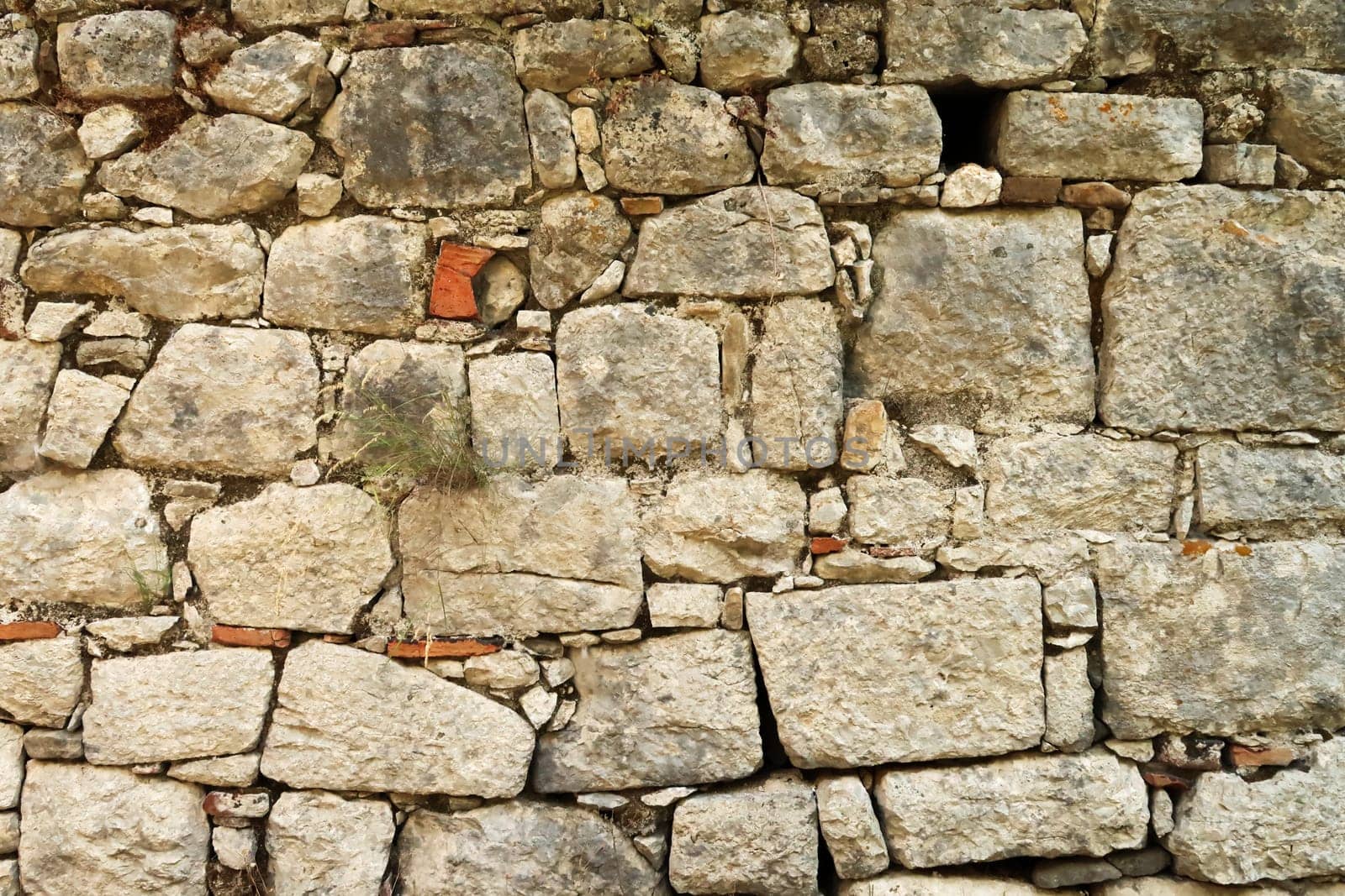 Close up view onto the bricks of a roman wall across the river at the ancient site of Olympos, Olympus, close to Antalya, Turkey 2022