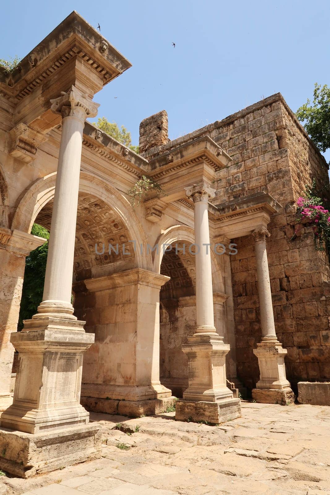 The impressive Hadrians Gate, famous ancient roman landmark in Antalya, Turkey 2022