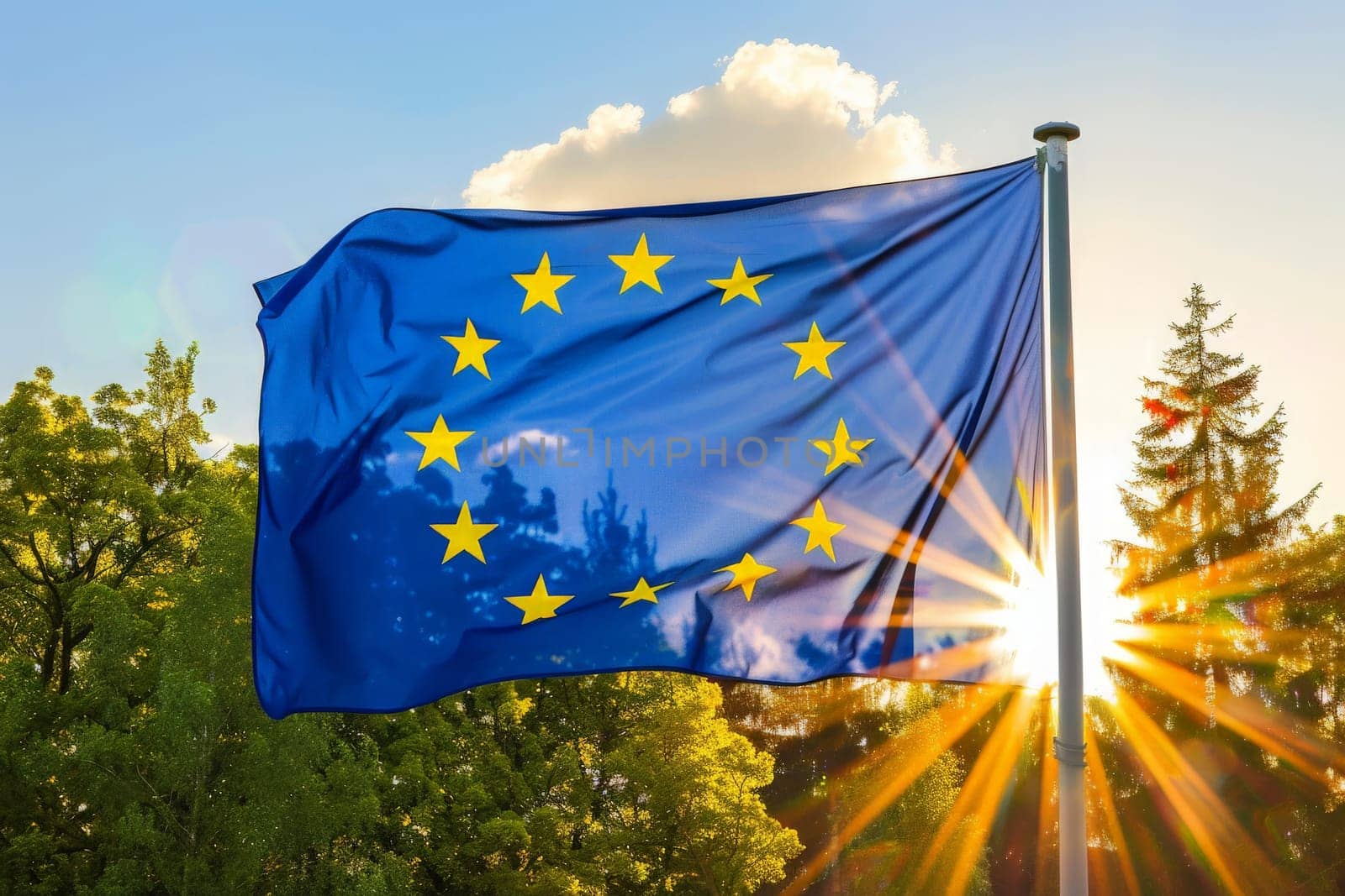 A European flag flutters gracefully in front of a radiant sun in a symbol of unity and pride.