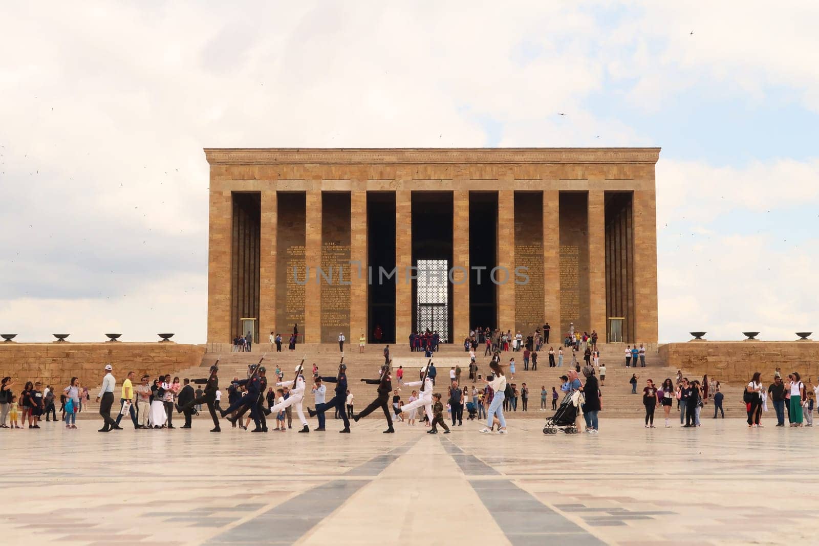 Turkish soldiers are marching on the Ceremonial Plaza of the Anitkabir complex, monument, memorial with the Hall of Honor in the background, housing the tomb of Atatürk, Ataturk, Ankara, Turkey, 1st of July 2022