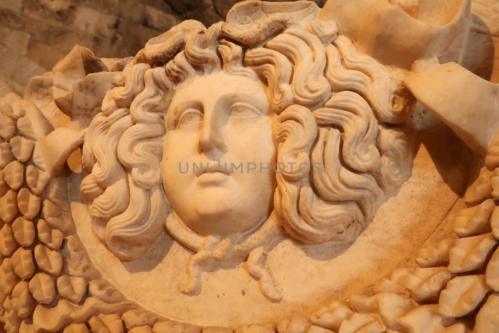 Head of medusa relief on a roman sarcophagus at the Hierapolis museum, Pamukkale, Denizli, Turkey, 20th of May 2022