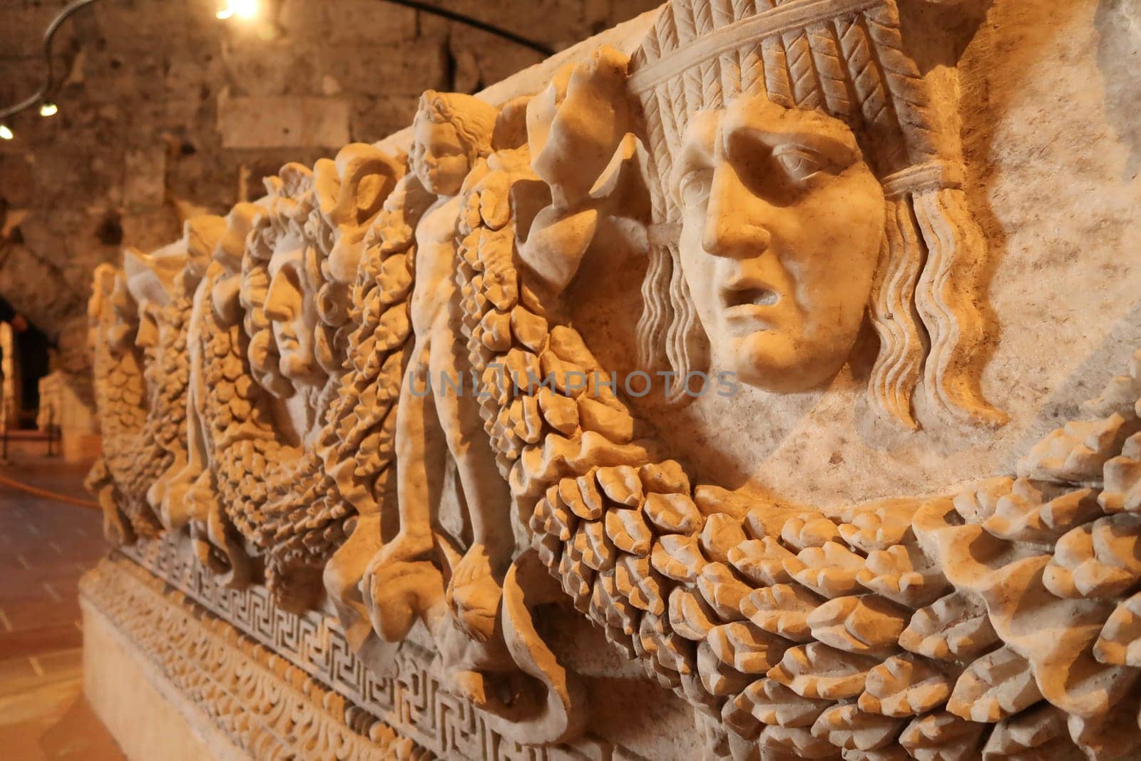 Elaborate reliefs on a roman sarcophagus at the Hierapolis Museum, Pamukkale, Denizli, Turkey, 20th of May 2022