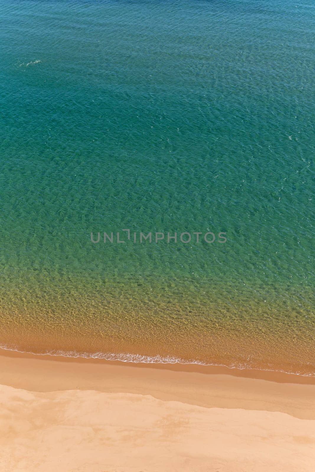 Turquoise water on the uncrowded beaches of Sagres in Algarve, Portugal