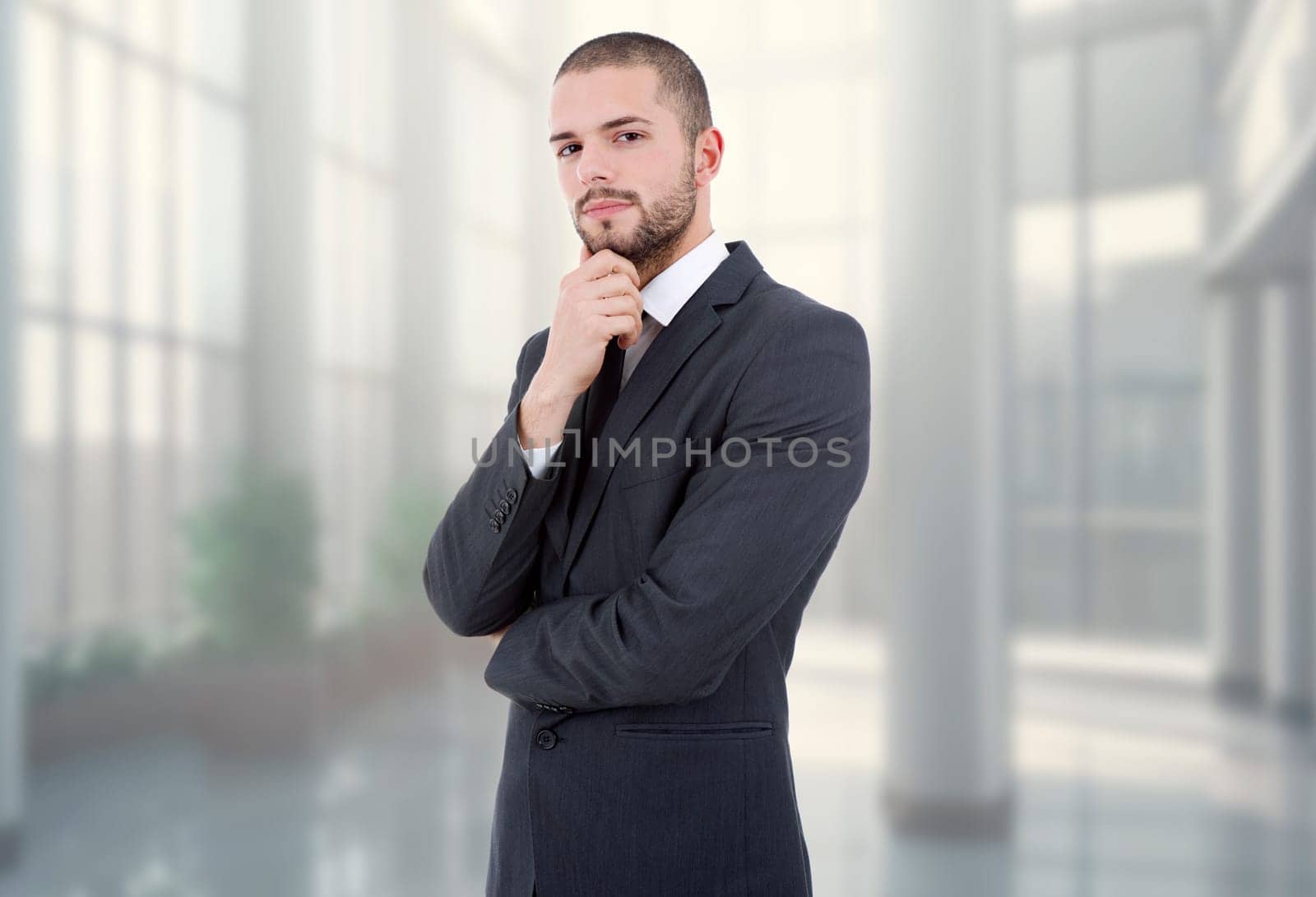 young business man portrait at the office