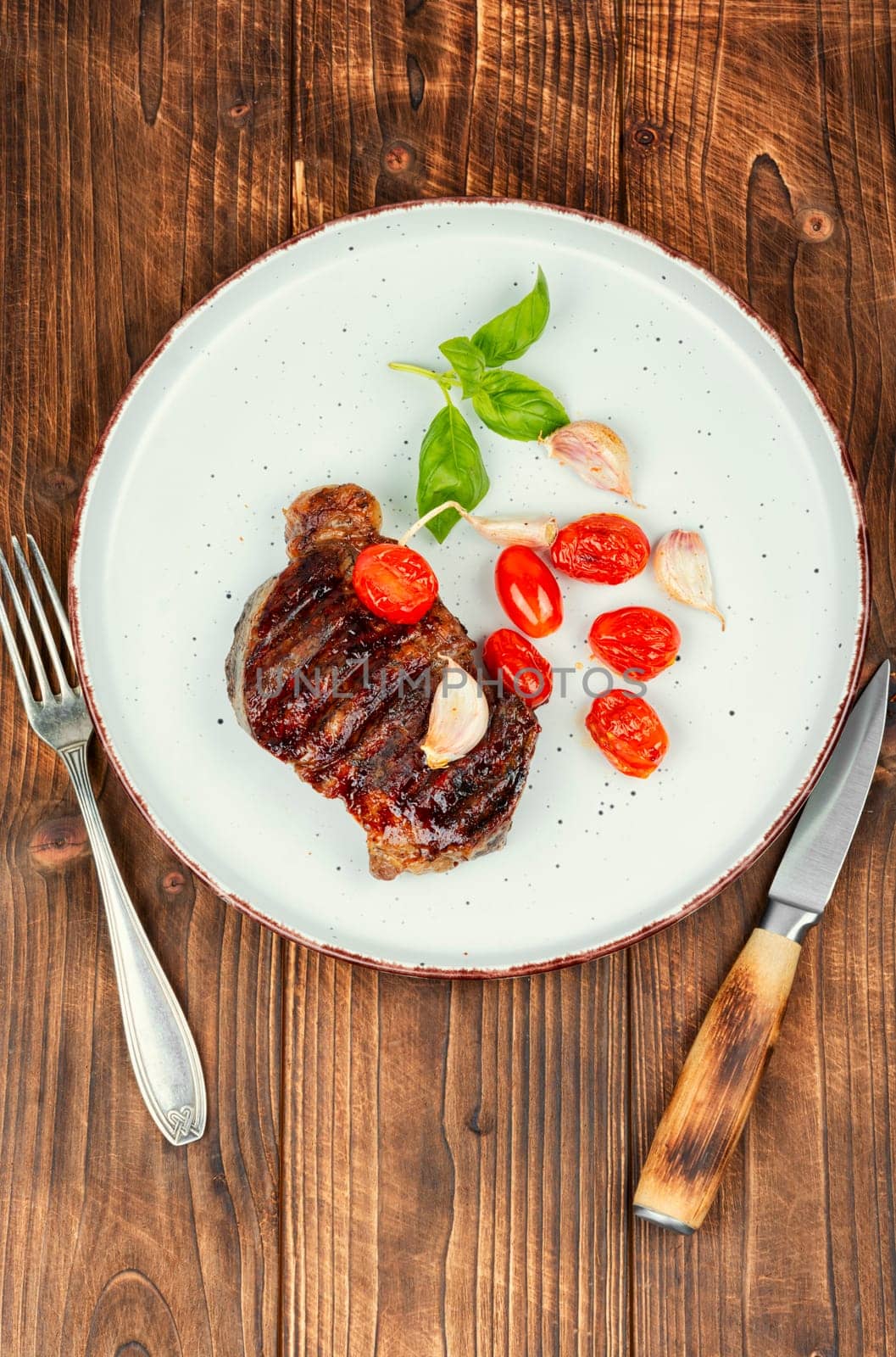 Juicy meat classic grilled steak, beef steak. BBQ, roasted meat.