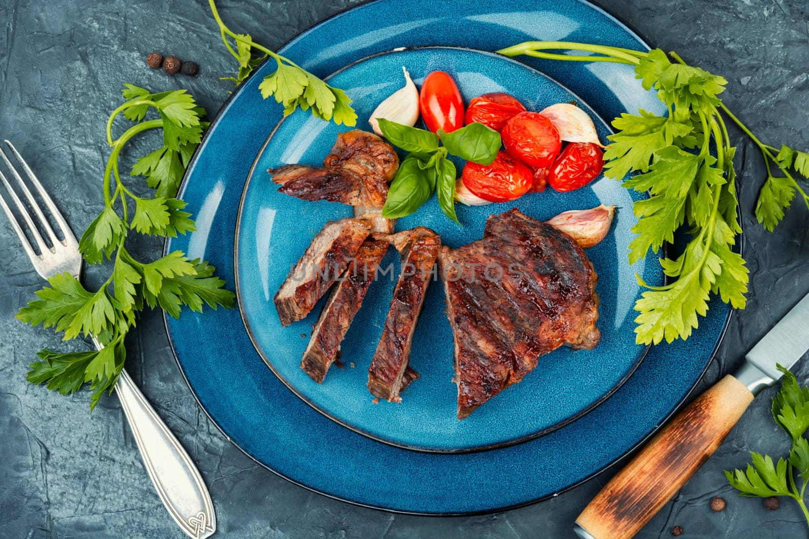 Juicy meat classic grilled steak, beef steak. BBQ, roasted meat.