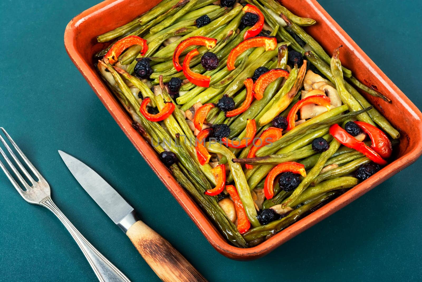 Vegetable pie with green or bush beans and peppers. Delicious snack. Top view.