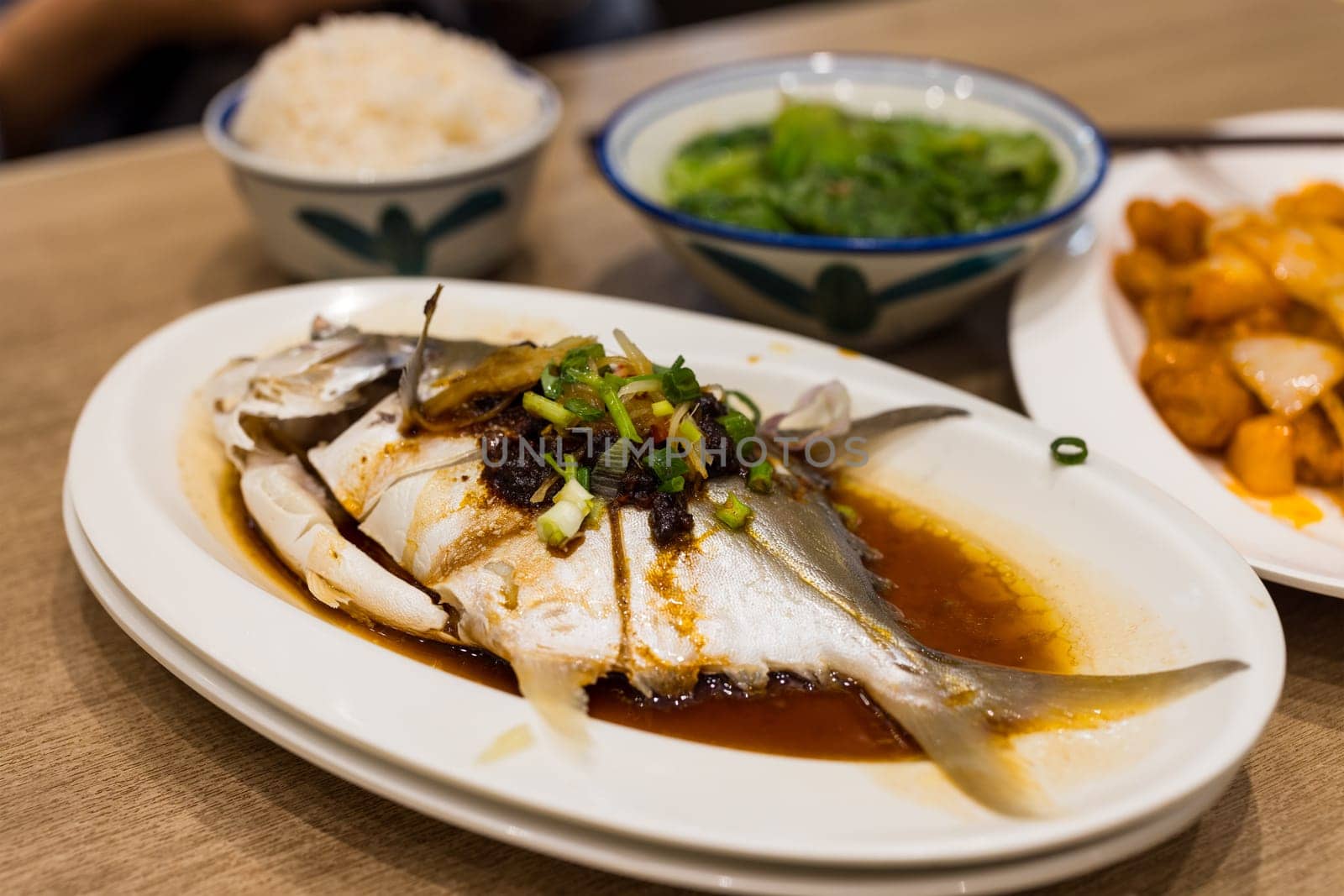 Steamed fish with soy sauce in Hong Kong cuisine restaurant