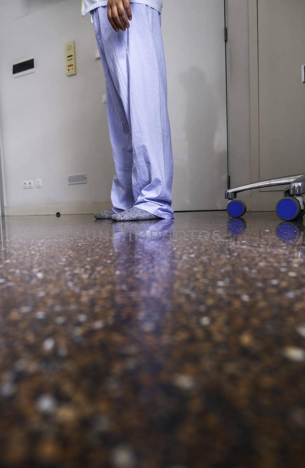 Detail of a patient in a hospital room, illness and healing