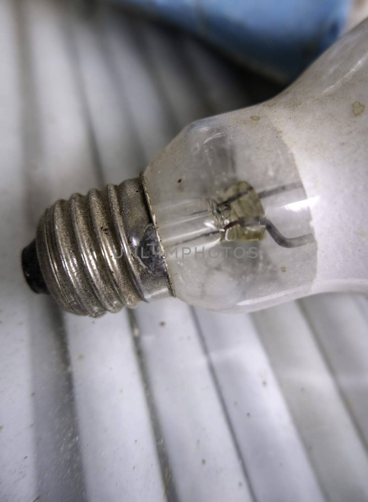 Detail of old damaged and discarded light bulbs, recycling