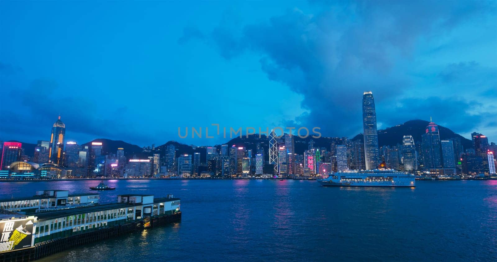 Victoria Harbor, Hong Kong 06 July 2019: Hong Kong at night