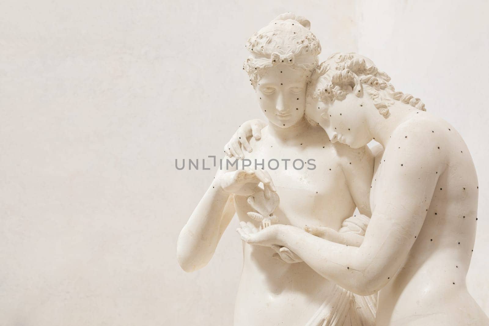 Possagno, Italy - 29 June 2023: Cupid and Psyche statue by sculptor Antonio Canova, 1800. Sensual hug, love and togetherness emotion.