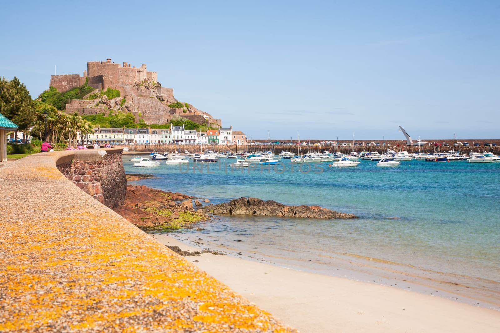 Gorey, Jersey - May 15 2011: Gorey harbour and Mont Orgueil Castle, Jersey, in The Channel Islands