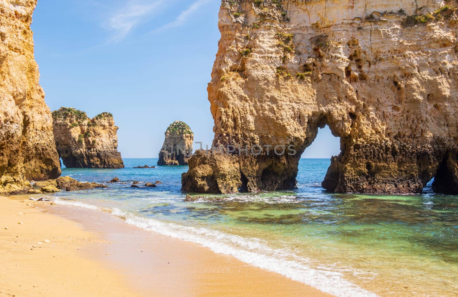 Small, heavenly and difficult to access beach photographed near Portimão in the Algarve region of Portugal