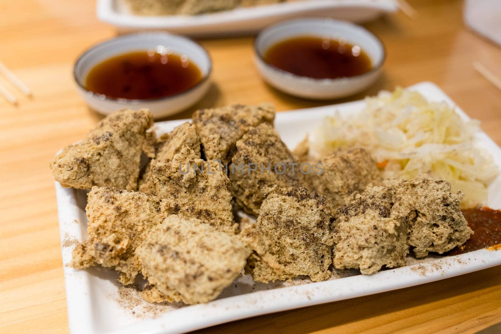 Deep fry stinky tofu on the dish