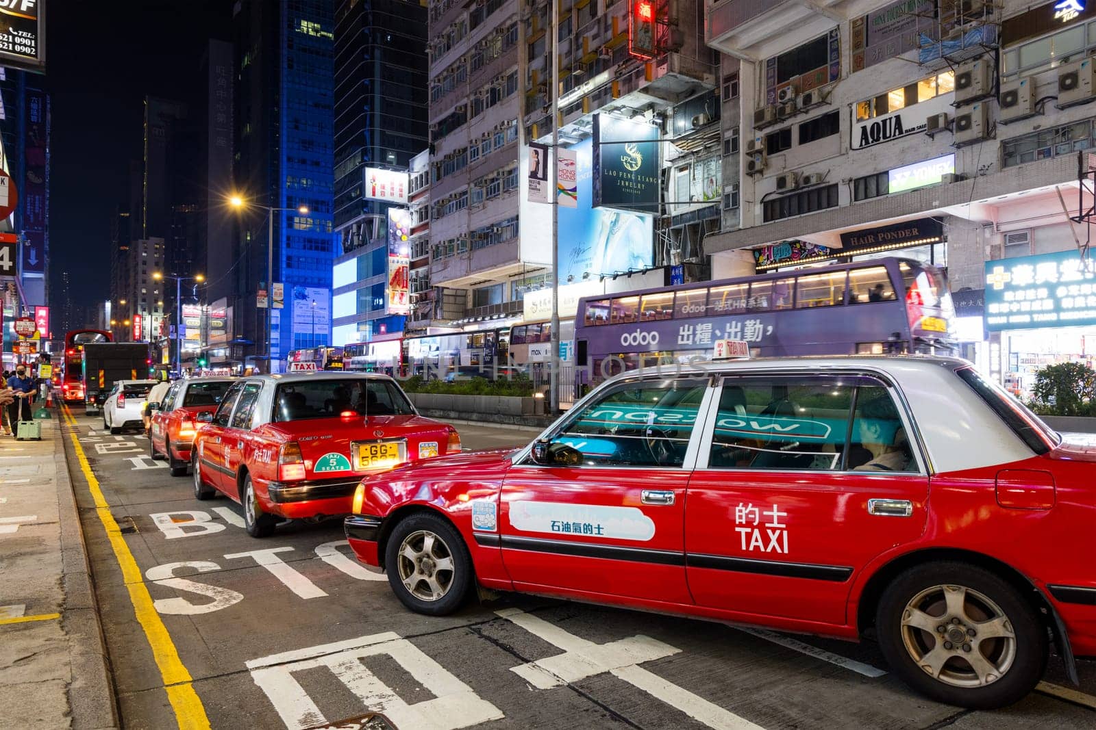 Hong Kong 02 April 2024: Taxi line up at the street in Hong Kong city in Mong kok district