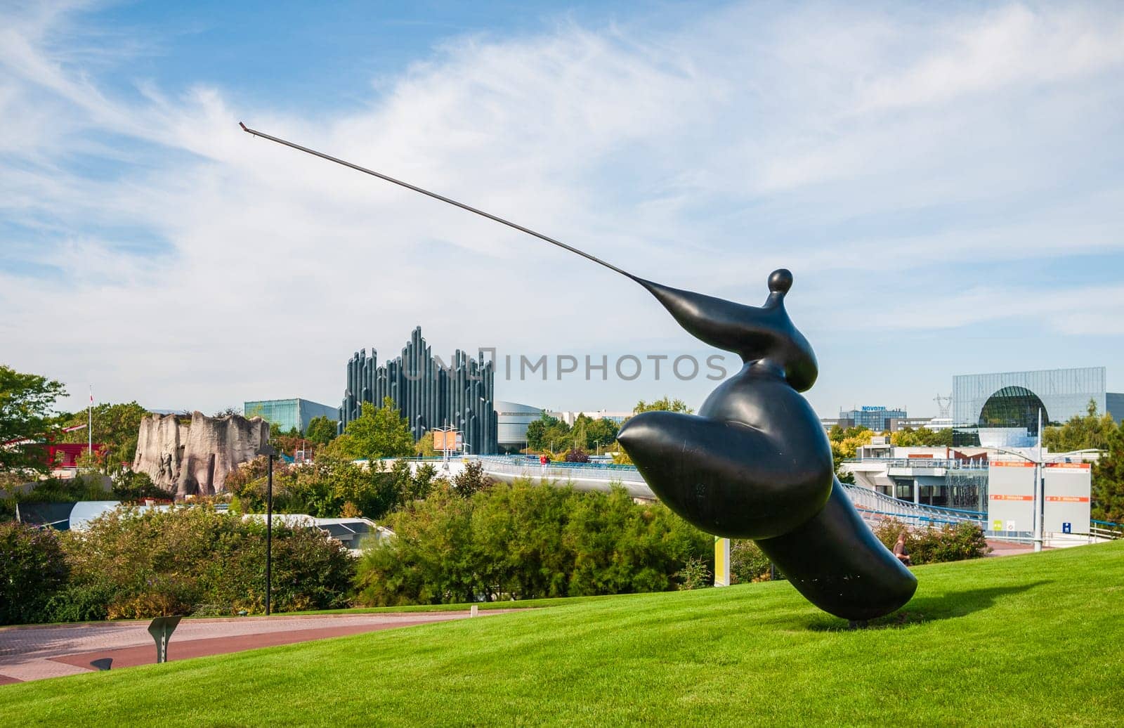 Poitiers, France - September 18, 2010: General view of the pavilions of the Futuroscope theme park in Poitiers. Sculpture by Jean-Louis Toutain