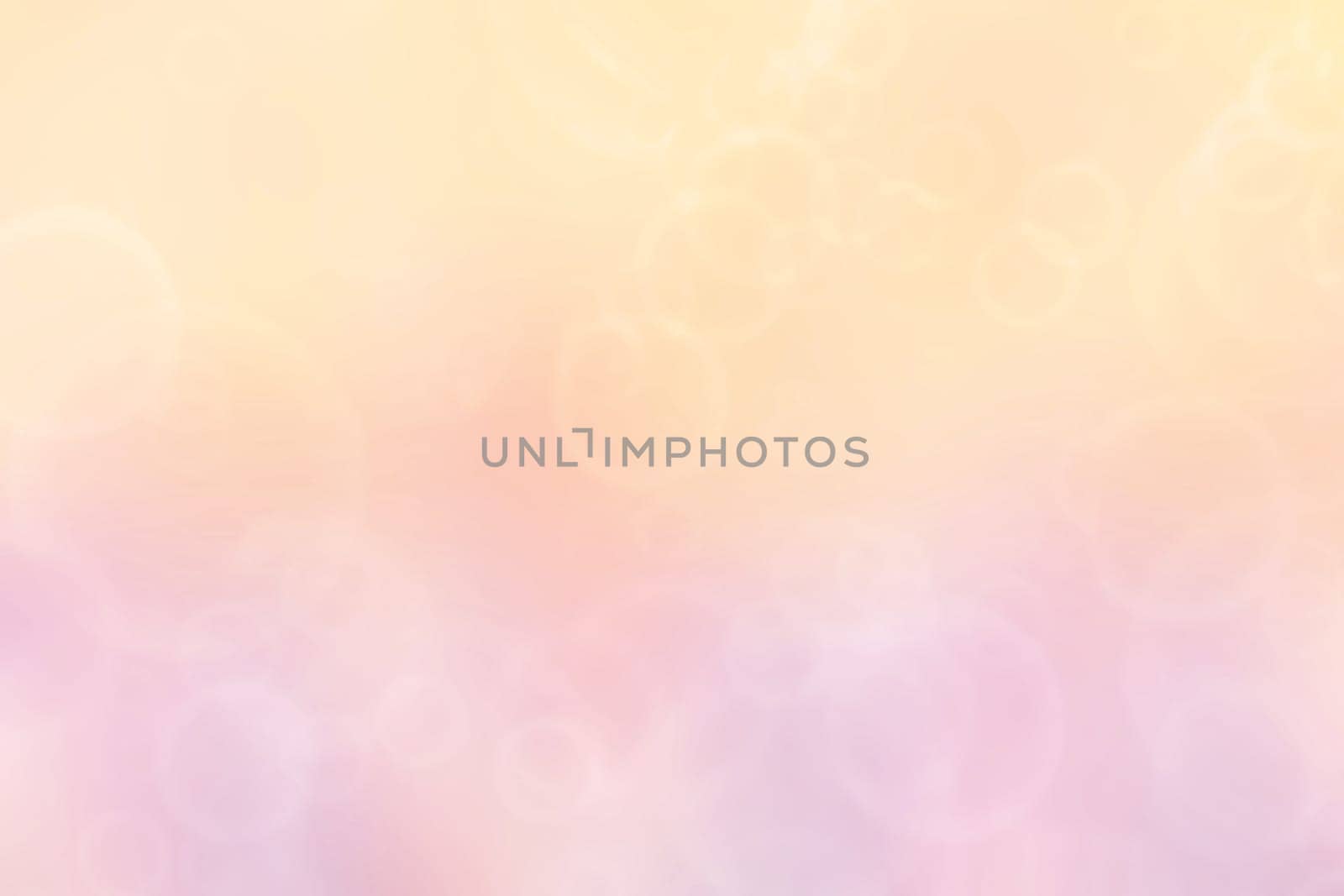 Abstract blurred vivid spring summer light delicate pastel blue orange yellow bokeh background texture with bright soft color circles. Card concept. Beautiful backdrop illustration.