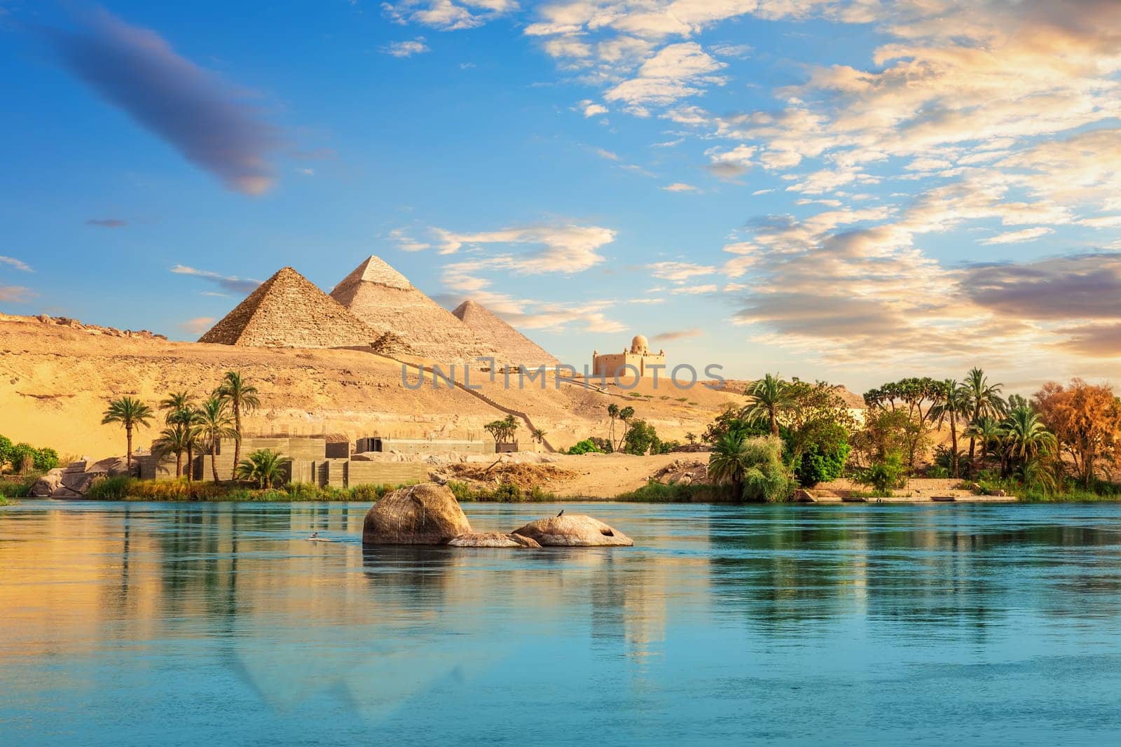 Ancient rocks in the Nile on the way to pyramids, Aswan, Egypt.