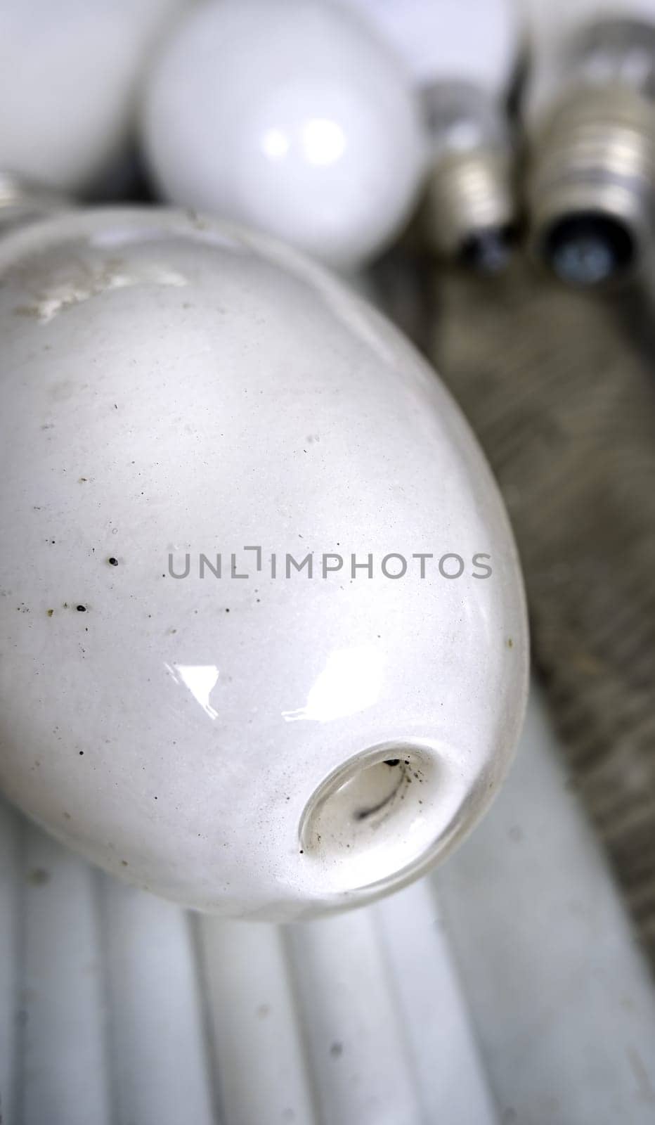 Detail of old damaged and discarded light bulbs, recycling