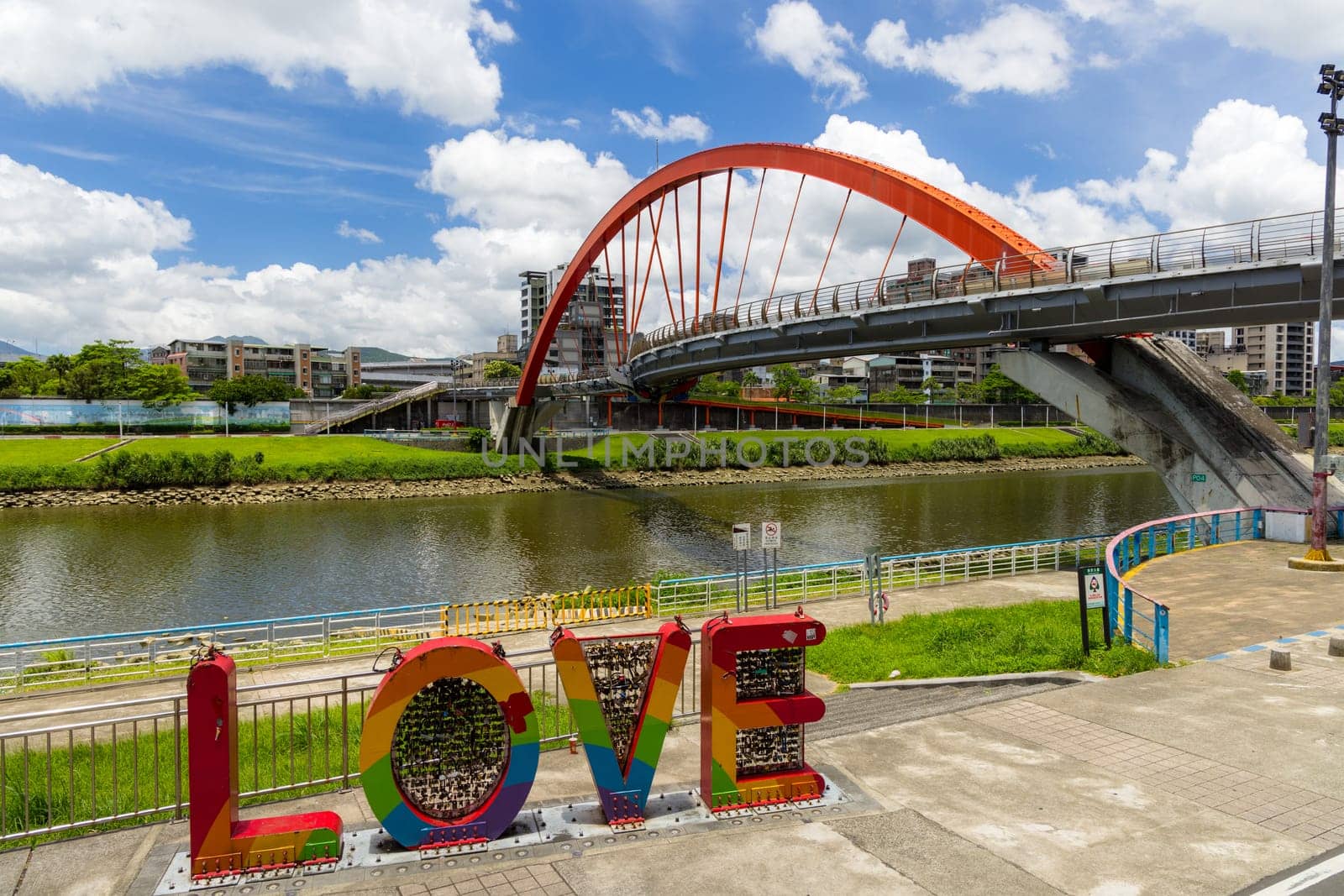 Taipei, Taiwan 25 July 2023: Red bridge over the river in Taipei city